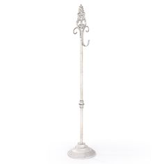 an ornate white coat stand on a white background with no one in it or someone else