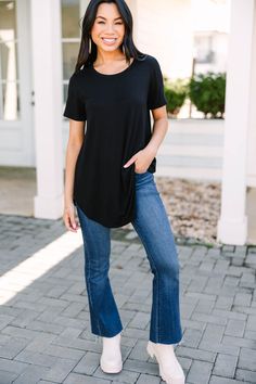 For all your meetups with friends, Saturday strolls, and lazy Sundays, this will be your go to top! This classic t-shirt is a versatile piece that can be worn with jeans, skirts, joggers, and more. This top features a relaxed fit and soft stretch fabric, round neckline, and short sleeves. Material has generous amount of stretch. Cindy is wearing the small. Black Casual T-shirt For Gatherings, Mint Julep Boutique, Lazy Sunday, Mint Julep, Easy Going, Black Top, Round Neckline, Stretch Fabric, Classic T Shirts