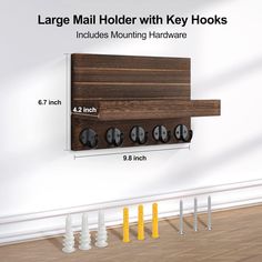 the large mail holder with key hooks includes mounting hardware and 8 inch screws in each