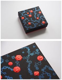 two pictures of an open box with red and blue designs on it