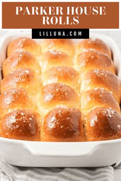 a white casserole dish filled with baked rolls