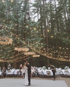 an instagram page with a photo of a bride and groom at their wedding in the woods