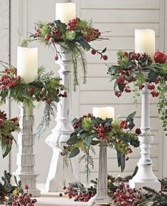 christmas decorations with candles and greenery