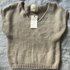 Nwt. No Size But Fits A Small Casual Soft Knit Beige Sweater Vest, Beige Knitted Tops For Fall, Casual Beige Soft Knit Sweater Vest, Everyday Beige Knit Sweater Vest, Beige Knit Sweater Vest For Everyday, Cream Chunky Knit Cotton Top, Cozy Beige Knitted Tops, Casual Knitted Cream Sweater Vest, Casual Cream Knitted Sweater Vest