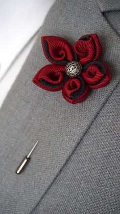 "Handmade 5 Petal/2 Colors Kanzashi Flower Lapel Pin/Brooch Size: 2\" This purchase is for one handmade lapel pin/brooch in Red & Black. Your choice of either clutch back or lapel pin. This flower is created using 2 colors however, If you love this design but would like different colors, select \"custom colors\" and send us a direct message. We'd be happy to work with you on a custom order. Each one of our lapel flowers is handmade and unique. Handmade items are made-to-order so they will be Elegant Wedding Pins With Flower Decoration, Elegant Handmade Lapel Pin For Formal Occasions, Elegant Handmade Flower Pins For Gifts, Flower Shaped Wedding Pins With Flower Decoration, Handmade Flower Shaped Brooches For Formal Occasions, Elegant Wedding Pins With Handmade Flowers, Elegant Flower Wedding Pins, Elegant Rosette Wedding Brooches, Flower Shaped Wedding Brooch Pin