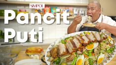 an old man eating food from a plate with the words pancit puti on it