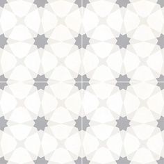 a white and gray tile pattern with stars