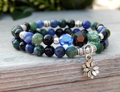 set of 2 nature bracelets Earthy Blue, Black Beaded Bracelets, Blue Sodalite, Green Beads, Nature Bracelets, Support Small Business, Flower Charm, Green Bead, Green And Blue