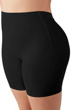 Designed to smooth the thighs, these shaping shorts are cinched at the waist with more room in the hips and bottom to fit and flatter an hourglass figure. Hidden stays keep it from rolling or losing its shape, and the V-back and raw edges keep it smooth and discreet under low-back outfits. 5 1/2" inseam Moderate control Cotton-lined gusset 54% polyamide, 46% spandex Hand wash, dry flat Imported Compressive Smoothing High-waisted Shorts, Fitted High-waisted Shapewear Biker Shorts, Fitted High-waisted Biker Shorts Shapewear, High Waist Smoothing Fitted Shorts, Fitted Shapewear Shorts, Fitted Solid Color Shapewear Shorts, Compressive High Waist Smoothing Shorts, High-waisted Stretch Smoothing Shorts, High Waist Compressive Smoothing Shorts