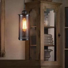 a light that is hanging from the side of a cabinet