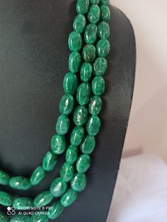 AAA 734 Carat Emerald beryl Oval Shape Fine Quality Smooth Beads With Adjustable Cord Necklace Stone : Emerald beryl Shape :- Oval Size :-6x8 - 12x17mm length - 18 inch, 3 line strings Weight :- 734 carat Polish :- Handmade color - green It is known as the 'love stone' as the message it emits is the strong vibration of unconditional love, joy, warmth and healing. As quartz crystals are profound amplifiers of energy, it may help to kindle happiness, love, romantic feelings and sensuality. It is g Elegant Oval Gemstone Beads, Oval Emerald Gemstone Beads Necklace Gift, Elegant Gemstone Oval Beads, Emerald Necklace With Oval Gemstone Beads For Jewelry Making, Oval Emerald Bead Necklace For Jewelry Making, Green Oval Gemstone Beads Necklace, Green Oval Gemstone Bead Necklace, Green Oval Gemstone Beaded Necklace, Green Oval Gemstone Beaded Necklaces