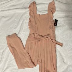 Nwt Ruffled Pink Jumpsuit. Even Has Pockets! Casual Fitted Jumpsuits And Rompers With Ruffle Hem, Spring Jumpsuits And Rompers With Ruffled Straps, Casual Ruffled Jumpsuits And Rompers, Chic Jumpsuits And Rompers With Ruffled Straps For Spring, Chic Spring Jumpsuits And Rompers With Ruffled Straps, Trendy Ruffled Jumpsuits And Rompers For Day Out, Chic Pink Jumpsuits And Rompers With Ruffles, Spring Casual Jumpsuits And Rompers With Ruffle Hem, Spring Ruffled Overall Jumpsuits And Rompers