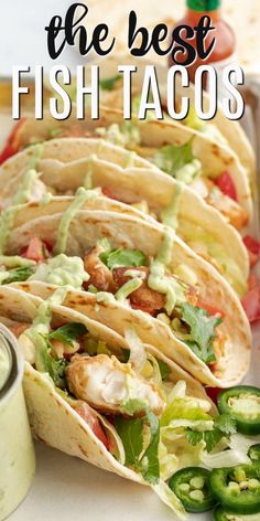 the best fish tacos with avocado sauce and jalapenos