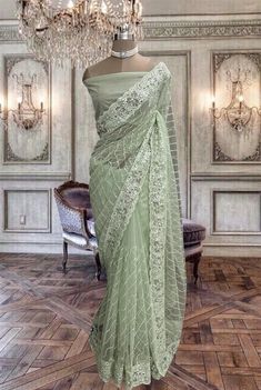 Beautiful pastel green net saree with sequins work and running blouse piece Pastel Green Net Saree, Sage Saree, Sage Green Saree, Pastel Green Saree, Green Net Saree, Mint Green Saree, Farewell Sarees, Green Sari, Saree For Wedding Function