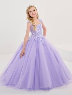 Your sweet girl will dazzle the room in this sequined lace applique long sleeveless dress with A-line tulle skirt by Tiffany Princess 13702. This sleeveless gown features a straight across neckline with sequin lace appliques, floor length A-line sparkle tulle skirt, sweep train, and a lace-up back. House of Wu Tiffany Princess Collection Spring 2023 Style Number: 13702 Fabric: Sparkle Tulle/Sequin Lace Appliques Please note: There may be a loss of glitter while wearing this dress due to the natu Sleeveless Tulle Ball Gown With Lace Bodice, Sleeveless Tulle Gown With Lace Bodice, Sleeveless Lace Gown With Tulle Skirt, Sleeveless Lace Bodice Ball Gown For Prom, Sleeveless Lace Bodice Ball Gown For Prom Season, Sleeveless Ball Gown With Lace Bodice For Prom, Sleeveless Pageant Dress With Sheer Bodice, Princess Style Sleeveless Pageant Dress With Fitted Bodice, Purple Sleeveless Dress For Pageant