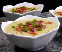 three bowls of mashed potato cheese soup with celery and bacon in them