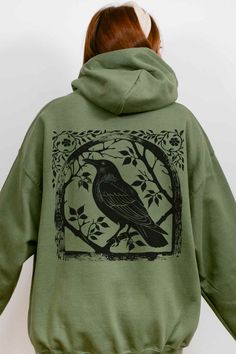 Embrace the mystery with this Raven Crowcore hoodie, perfect for adding a dark, edgy vibe to your style. 🖤✨ #Crowcore #RavenHoodie Relaxed Fit Hoodie With Band Merch Screen Print, Relaxed Fit Band Merch Hoodie With Screen Print, Long Sleeve Fleece Hoodie With Screen Print, Fall Hooded Sweatshirt With Screen Print, Winter Band Merch Hoodie Pre-shrunk, Hooded Hoodie With Screen Print For Fall, Hooded Fall Sweatshirt Pre-shrunk, Screen Print Hooded Hoodie For Fall, Fall Season Screen Print Hooded Hoodie