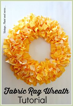 the fabric rag wreath is made with yellow flowers