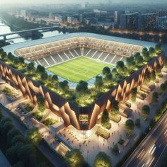 an aerial view of a soccer stadium with trees and lights on the side of it