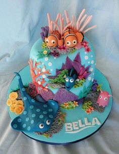 a birthday cake decorated with sea animals and fish