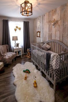 a baby's room is decorated with wood paneled walls and white rugs