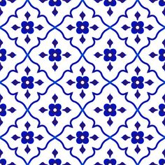 a blue and white tile pattern with an intricate design on the outside, in shades of blue