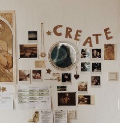 a white wall covered in photos and magnets with the word create written on it