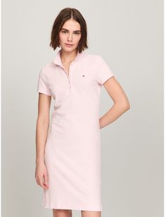 Tommy Hilfiger women's dress. It's everything you love about our polos (the precise cut, flattering drape) styled as a dress in comfortable, stretch cotton.  Material: 97% Regenerative Cotton, 3% Elastane. Tommy Hilfiger Outfits Women Dresses, Classic Fitted Polo Dress, Elegant Spring Workwear Polo Dress, Solid Color Cotton Knee-length Shirt Dress, Elegant Spring Polo Dress For Work, Fitted Solid Color Cotton Shirt Dress, Fitted Cotton Solid Color Shirt Dress, Fitted Cotton Shirt Dress, Classic Cotton Knee-length Midi Dress