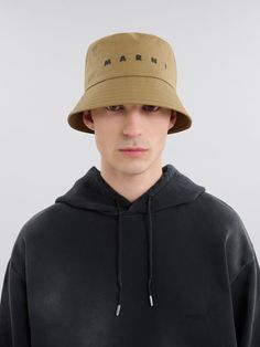 Bucket hat made from organic cotton gabardine. Embellished with embroidered Marni lettering on the front. Lined in cotton. Flat Brim Cotton Hat With Logo, Flat Heel Boots, Trunk Bag, Women Essentials, Boot Accessories, Lacing Sneakers, Market Bag, Cool Socks, Hat Making