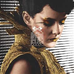 a woman with gold makeup and black hair