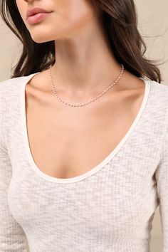 There is no easier way to elevate any ensemble than with the Lulus Classic Perfection 14KT Gold Pearl Chain Necklace! This delicate, 14KT gold-plated necklace features dainty, glowing faux pearl beads that are interspersed along the slender chain silhouette. Create a lovely layered look with this piece, or wear it on its own for an exceptionally simple style! This item is plated with real 14KT gold. Love it and it will love you back! Remove before exercising or showering, and when applying scents, lotions and sprays. Lobster clasp closure. Necklace Measures 15. 5" Long With A 3" Extender Chain. 30% 14K Gold Dipped Brass, 70% Plastic. Imported. Lulus | Classic Perfection 14KT Gold Pearl Chain Necklace. Pearl Chain Necklace, Faux Pearl Necklace, Gold Dipped, Pearl Chain, Gold Plated Necklace, Layered Look, Gold Pearl, 14kt Gold, Pearl Beads