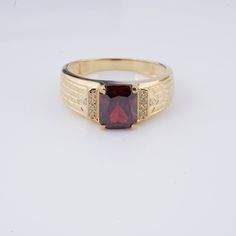 Emerald Garnet Gold Plated Ring , 2CT Red Gemstone Four Prong Wedding Ring 14K Gold Plated Handmade Ring Jewelry 925 Sterling Silver  1.Presenting the exquisite Emerald Garnet Gold Plated Ring, a representation of refinement and class. With a stunning 2CT red ruby set in a delicate four-prong setting, this magnificent piece has a timeless beauty that will dazzle everyone who sees it. Our talented artisans have painstakingly fashioned this ring by hand, making it a true masterpiece. 2.The best 92 Ruby Set, Signet Ring Men, Garnet And Gold, Hand Making, Red Gemstones, Garnet Ring, Plated Ring, Gold Plated Rings, Red Ruby