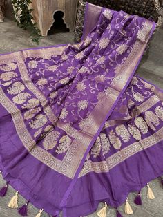 Beautiful and soft cotton silk Purple Banarsi dupatta finished with pretty tassels. Bohemian Cotton Silk Sheer Dupatta, Purple Unstitched Dupatta For Transitional Season, Celebration Sheer Slub Silk Dupatta, Purple Dupatta For Festive Transitional Season, Purple Dupatta For Festive Occasions, Banarasi Silk Dupatta With Latkans In Traditional Drape, Traditional Banarasi Silk Dupatta With Latkans, Transitional Purple Banarasi Silk Dupatta, Bohemian Cotton Silk Dupatta For Diwali