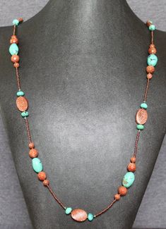 The warm metallic glitter of goldstone pairs beautifully with the natural veins in the turquoise to form this one-of-a-kind necklace. Each grouping of larger beads is framed with a stretch of seed beads in a copper tone to match the goldstone. This versatile necklace can be worn as a single strand, Artisan Beaded Brown Turquoise Necklace, Artisan Brown Beaded Turquoise Necklace, Traditional Turquoise Jewelry, Beads Craft, Nice Jewelry, Necklace Ideas, Jewellery Inspiration, Long Necklaces, Beaded Statement Necklace