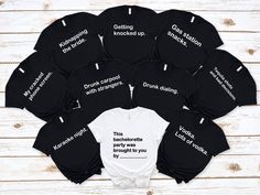 twelve personalized onesuits in black and white