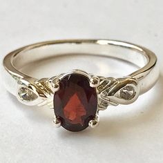 Silver Red Garnet Solitaire Cocktail Ring Dark Red Semi-Precious Garnet Stone. Made In Thailand. Dainty Styling Approximately 1 Carat Red Garnet Stone. 2 Clear Sparkly Aaa Grade Cubic Zirconias. Silver Plated Jewelers Brass Base Vintage Old Store Stock New Never Used. Comes In Sizes 6, 8 And 9. Garnet Wedding Rings, Garnet Ring Vintage, Garnet Wedding, Wedding Rings Art, Garnet Engagement Ring, Red Sapphire, Cute Engagement Rings, Garnet Jewelry, Gem Ring