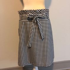 This Is The Cutest Black And White Checkered Brand New, With Tags Skirt By Cynthia Rowley. It Has Ruffles At The Waist And An Attached Tie On The Waist. It’s Great Quality And Has A Button And Zipper On The Side And 2 Back Pockets. Approximately 16” At The Waist And 22.5” Long. It’s Perfect For The Office Or For Teaching! No Swaps! Spring Plaid Skirt For Work, White Mini Skirt With Houndstooth Pattern, Plaid Pencil Skirt For Spring, Plaid Pencil Skirt For Spring Season, Chic Plaid Relaxed Skirt, Chic Relaxed Plaid Skirt, Chic Plaid Skort For Spring, Chic Gingham Skirt For Work, Gingham Mini Skirt For Day Out