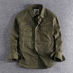 Khaki Cotton Tops With Pockets, Khaki Cotton Tops For Work, Casual Collar Cotton Top For Fall, Cotton Top With Spread Collar For Fall, Fall Cotton Top With Casual Collar, Khaki Cotton Winter Shirt, Khaki Cotton Top With Casual Collar, Cotton Top With Pockets And Casual Collar, Casual Khaki Cotton Shirt