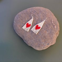 Small Red Heart Earrings OWN ORIGINAL PATTERN DESIGN! Dimensions: Width- 0.8 inches /2.1cm Length (incl. ear wires)- 2.4 inches /6 cm These adorable earrings are a fun and lovely accessory, perfect for a gift or just for no reason! They are made from OUR ORIGINAL pattern, made from high quality glass beads, very lightweight. *Please note that real colors may slightly differ from their appearance on your display! Ready to Ship! Made with love and will be shipped with care! All rights reserved. © Valentine's Day Jewelry With Dangling Beads As Gift, Valentine's Day Dangling Beads Jewelry Gift, Mother's Day Heart Beads Dangle Jewelry, Valentine's Day Jewelry Gift With Dangling Beads, Valentine's Day Gift Jewelry With Dangling Beads, Dangle Heart Bead Earrings Gift, Bohemian Drop Heart Earrings For Gift, Bohemian Heart-shaped Beaded Earrings For Gifts, Bohemian Style Heart Drop Earrings For Gift