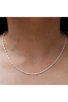 An Italian made sterling silver chain that will stand the test of time. Sterling silver Singapore chain necklace. Spring ring closure. Approx. 16" length. Made in Italy Sterling Silver Link Chain Necklace, Silver Link Chain Necklace In Sterling Silver, Sterling Silver Link Jewelry, Silver Sterling Silver Link Necklace, Sterling Silver Delicate Chain Necklace For Anniversary, Silver Sterling Silver Chain Necklace For Anniversary, Silver Clavicle Chain Link Jewelry, Anniversary Sterling Silver Delicate Chain Necklace, Sterling Silver Link Chain Jewelry