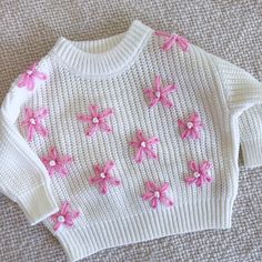 Simple Flower Hand Embroidered Baby Sweater Embroidered By Me. Size 3-6 Mo. Check Out My Instagram @Syds.Salty.Stitches! Cute White Embroidered Sweater, White Long Sleeve Sweater With Floral Applique, White Spring Sweater For Playtime, Cute White Sweater For Playtime, White Casual Spring Sweater For Playtime, Embroidered Baby Sweater, Coral Cardigan, Simple Flower, Star Sweater