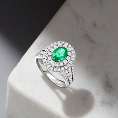 Ross-Simons - 1.00ct Emerald Ring, 1.35ct t. w. Diamonds in 18kt White Gold. Size 7. A sensational sight to behold, this heirloom-quality cocktail ring boasts a delicious 1.00 carat oval emerald that beams its verdant hue from inside a lavish double halo of 1.35 ct. t. w. round brilliant-cut diamonds. Finely crafted in polished 18kt white gold for a bright gleam on the finger. 5/8" wide. Diamond and emerald ring. Emerald birthstones are the perfect gift for May birthdays. White Gold Emerald Ring With Brilliant Cut Cluster, White Gold Cluster Emerald Ring With Brilliant Cut, Emerald Cluster Diamond Ring With Center Stone, Cluster Diamond Emerald Ring, Cluster Emerald Ring With Diamond Center Stone, Cluster Emerald Diamond Ring With Center Stone, Cluster Emerald Ring With Diamond, Cluster Emerald Ring In White Gold With Center Stone, Dazzling Platinum Emerald Ring With Center Stone