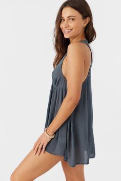 Cute and flowy cover-up dress to elevate your beach look. It features a solid color wash and deep v-neckline. O'Neill Women's woven cover-up dress Mini length Lightweight feel Solid color wash 100% Viscose Flowy V-neck Sundress For Beach Party, Breezy V-neck Sundress For Beach Season, Flowy V-neck Sundress For Vacation, Flowy V-neck Summer Beach Dress, V-neck Rayon Beach Dress, V-neck Sundress Style Cover-up For Beach Party, Breezy Flowy V-neck Sundress, Flowy V-neck Breezy Cover-up, Flowy V-neck Dresses For Poolside