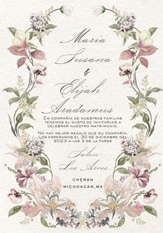 a wedding card with flowers and leaves