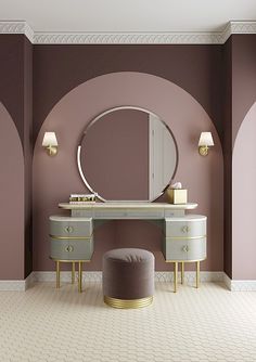 a dressing table and stool with a mirror on the wall in a room that has pink walls