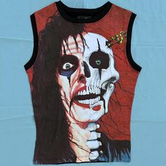 Alice Cooper Still Shocks Rock & Roll Audiences To This Day. Get This Classic Alice All-Over Print Tee Like The Tee Alice Wears On His 1989 Release Titled "Trash". This Tee Is A Cut & Sew Style Tee For A Full Front Wrap Print. Gently Worn. Size Is Small/Petite. Dimensions Are 21.5" High X 15" Wide Alice Cooper, Rock Roll, Print Tee, Printed Tees, Fashion Tees, Print Tops, All Over Print, Rock And Roll, The Incredibles