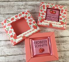 three pink frames with strawberrys on them