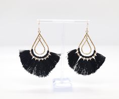 Black Teardrop Tassel Earrings are elegant and contemporary pieces of jewelry, featuring a sleek teardrop design with cascading tassels. They exude sophistication and style, with the black color providing a versatile and dramatic look suitable for various occasions. Dramatic Look, Tennis Bracelet, Christmas Sale, Tassel Earrings, Rainbow Colors, The Black, Black Color, Tassels, Sleek