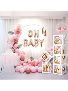 a baby shower with balloons and decorations