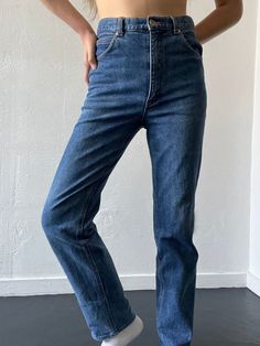 Medium wash high waisted jeans with a zip fly, belt loops and pockets. Has some stretch. In excellent vintage condition. DETAILSLabel: BoroMaterial: 98% Cotton, 2% PolyurethaneSIZE & MEASUREMENTSWaist: 30"Hips: 32"Rise: 11.5"Inseam: 29"Leg Opening: 7.5" Dark Wash Straight Leg Pants With Zip Fly, Retro Straight Jeans With Five Pockets, High Waist Flare Jeans With Zip Fly, Classic Medium Wash High Waist Pants, Classic High Waist Medium Wash Pants, Dark Wash Straight Leg Jeans With Zip Fly, Medium Wash Straight Leg Bottoms With Zip Fly, High Waist Dark Wash Pants With Zip Fly, Retro High Waist Bottoms With Five Pockets